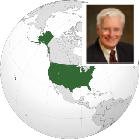 Photo of Elon Gasper, smiling man, short wavy white hair